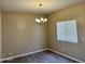 Dining room features tile floors, neutral colored walls, and bright natural light at 720 W Lydia Ln, Phoenix, AZ 85041