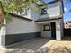 View of the exterior showing the attached garage and entryway of the two-story home at 720 W Lydia Ln, Phoenix, AZ 85041