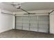 Spacious two-car garage with an automatic door provides ample room for parking and storage at 720 W Lydia Ln, Phoenix, AZ 85041