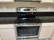 Stainless steel electric oven and range installed in a bright kitchen setting at 720 W Lydia Ln, Phoenix, AZ 85041