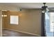 Bright living room with stylish tile flooring and access to the outdoor balcony at 720 W Lydia Ln, Phoenix, AZ 85041
