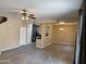 Open concept living area featuring tile floors and lots of natural light with kitchen views at 720 W Lydia Ln, Phoenix, AZ 85041