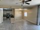 Open-concept area displays the kitchen's stainless steel appliances with connection to the dining and living areas at 720 W Lydia Ln, Phoenix, AZ 85041