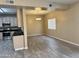 Living space with stainless steel appliances in the kitchen, open floor plan and lots of light at 720 W Lydia Ln, Phoenix, AZ 85041