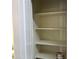 Spacious pantry with multiple shelves for organized storage solutions at 720 W Lydia Ln, Phoenix, AZ 85041