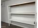 Basic shelving inside of the garage providing additional storage space at 720 W Lydia Ln, Phoenix, AZ 85041