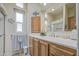 Bright bathroom featuring a shower, vanity, and decorated in white, which enhances its appeal at 7750 E Broadway Rd # 535, Mesa, AZ 85208