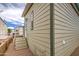 Exterior shot of manufactured home featuring classic siding and back entry stairs at 7750 E Broadway Rd # 535, Mesa, AZ 85208