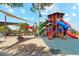 Community playground with multiple slides and play equipment at 8440 W Clemente Way, Florence, AZ 85132