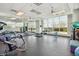 Spacious gym featuring free weights, benches, and ample sunlight at 8484 W Clemente Way, Florence, AZ 85132