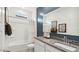 Bathroom features granite counters, shower over tub and designer color palette at 8519 W Clemente Way, Florence, AZ 85132