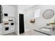 Bright bathroom features granite counters, shower over tub and decorative shelving at 8519 W Clemente Way, Florence, AZ 85132