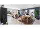 Open living room boasts modern decor, large windows, and comfortable seating arrangements at 8519 W Clemente Way, Florence, AZ 85132
