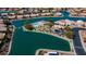 Aerial view of a waterfront community highlighting a pool, community center, and serene water access at 10387 W Runion Dr, Peoria, AZ 85382