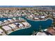 Scenic aerial shot of waterfront homes, showcasing community and backyard pools at 10387 W Runion Dr, Peoria, AZ 85382