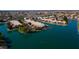 Stunning aerial view of waterfront homes with lush landscaping and tranquil blue waters at 10387 W Runion Dr, Peoria, AZ 85382