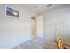 Cozy bedroom with wood floors, and ample closet space at 10387 W Runion Dr, Peoria, AZ 85382