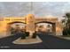 Community sign at The Landings Ventana Lakes with an address and palm trees at 10387 W Runion Dr, Peoria, AZ 85382