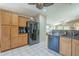 Modern kitchen featuring stainless steel appliances, and views to the living room at 10387 W Runion Dr, Peoria, AZ 85382