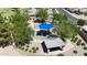 Aerial view of a neighborhood playground with shaded picnic areas at 10504 E Diamond Ave, Mesa, AZ 85208