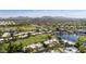 Panoramic aerial view showcasing the community's landscape, golf course, and surrounding homes at 1056 S 81St St, Mesa, AZ 85208