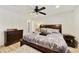 Comfortable bedroom features a ceiling fan, natural light and neutral walls perfect for relaxation at 1056 S 81St St, Mesa, AZ 85208