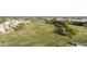 Picture of well-maintained golf course with green fairways and scattered trees at 1056 S 81St St, Mesa, AZ 85208