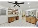 Bright kitchen area with modern appliances, tile floors, and wood cabinets at 1056 S 81St St, Mesa, AZ 85208