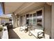 Cozy covered patio with comfortable seating, perfect for relaxing outdoors and enjoying the view at 1056 S 81St St, Mesa, AZ 85208