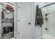 Bathroom with shower and walk in closet at 14419 W El Cortez Pl, Surprise, AZ 85387