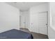Cozy bedroom featuring plush carpet and ample natural light at 14419 W El Cortez Pl, Surprise, AZ 85387