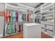 A large walk-in closet with custom shelving and ample storage, perfect for organization at 15716 W Sheridan St, Goodyear, AZ 85395