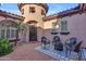 Charming courtyard featuring comfortable seating, a stylish rug, and a cozy fire pit at 15716 W Sheridan St, Goodyear, AZ 85395