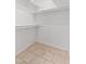 Walk-in closet features wire shelving and neutral colors at 15801 N 29Th St # 16, Phoenix, AZ 85032