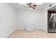 Bright dining area with neutral tile flooring, natural light from the skylight, and stainless steel appliances at 15801 N 29Th St # 16, Phoenix, AZ 85032