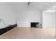 Spacious, bright living room with vaulted ceilings, neutral tile flooring and fresh white paint, ready for your personal touch at 15801 N 29Th St # 16, Phoenix, AZ 85032