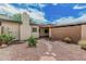 Backyard showcasing a gravel ground cover and desert landscaping at 1822 W Rose Ln, Phoenix, AZ 85015