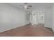 Spacious bedroom with brown flooring and access to en-suite bathroom at 1822 W Rose Ln, Phoenix, AZ 85015
