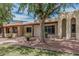 Charming single-story home with covered porch and desert landscaping at 1822 W Rose Ln, Phoenix, AZ 85015