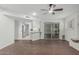 Bright living room featuring a breakfast bar, adjacent kitchen and sliding doors at 1822 W Rose Ln, Phoenix, AZ 85015