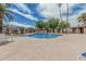 Community pool area offers a refreshing escape with palm trees and ample seating at 1822 W Rose Ln, Phoenix, AZ 85015