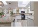Modern kitchen featuring granite countertops and stainless steel appliances at 18843 N 45Th Ave, Glendale, AZ 85308