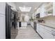 Spacious kitchen featuring stainless steel appliances and ample counter space at 18843 N 45Th Ave, Glendale, AZ 85308