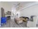 Inviting living room features a fireplace, stylish furniture, and seamless access to the kitchen at 18843 N 45Th Ave, Glendale, AZ 85308