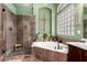 Relaxing bathroom features a soaking tub and a separate glass enclosed shower at 198 N Nevada Way, Gilbert, AZ 85233