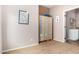 Neutral bedroom features carpet and a closet with mirrored doors, offering storage at 198 N Nevada Way, Gilbert, AZ 85233