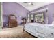 Spacious main bedroom features elegant furniture, ensuite bathroom access, and natural light at 198 N Nevada Way, Gilbert, AZ 85233