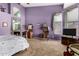 Spacious main bedroom features elegant furniture, ensuite bathroom access, and natural light at 198 N Nevada Way, Gilbert, AZ 85233