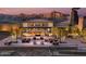 Exterior shot of the community clubhouse with outdoor seating and mountain views at 20638 W Berridge Ln, Buckeye, AZ 85396