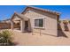 Backyard featuring neutral desert landscaping and covered patio with outdoor seating at 21277 E Cherrywood Dr, Queen Creek, AZ 85142